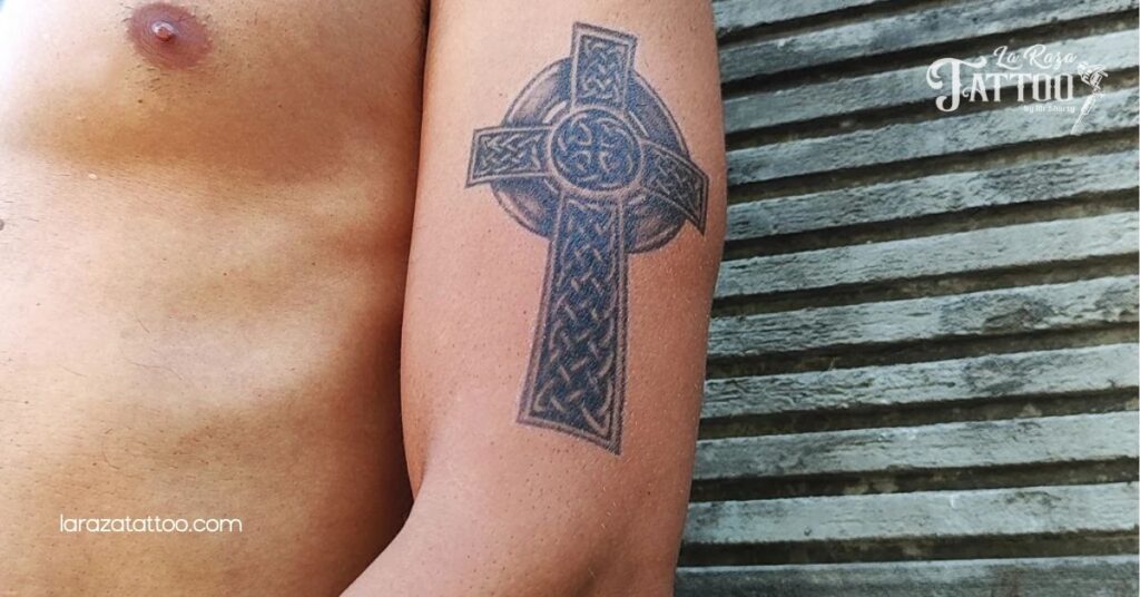 Discover the Meaning Behind Cross Tattoos on Shoulder: Design Ideas & Care Tips 6 Love and Sacrifice