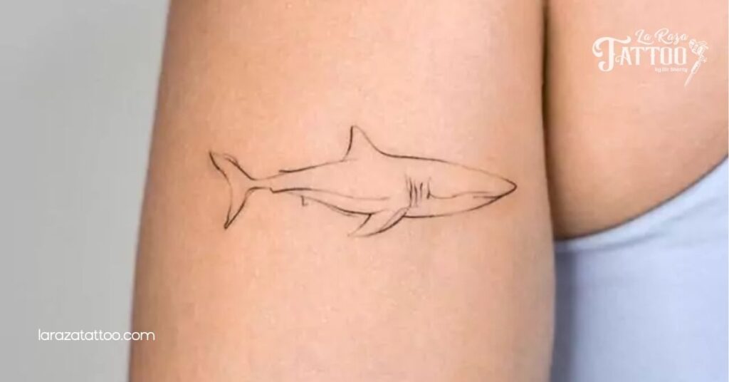 Discover the Meaning Behind Shark Outline Tattoos: Bold Symbols of Adventure and Strength 3 Minimalist Shark Outline Tattoos